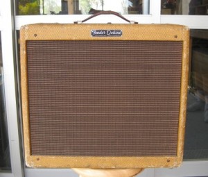 March of 1961 Fender Deluxe amp with large cabinet.